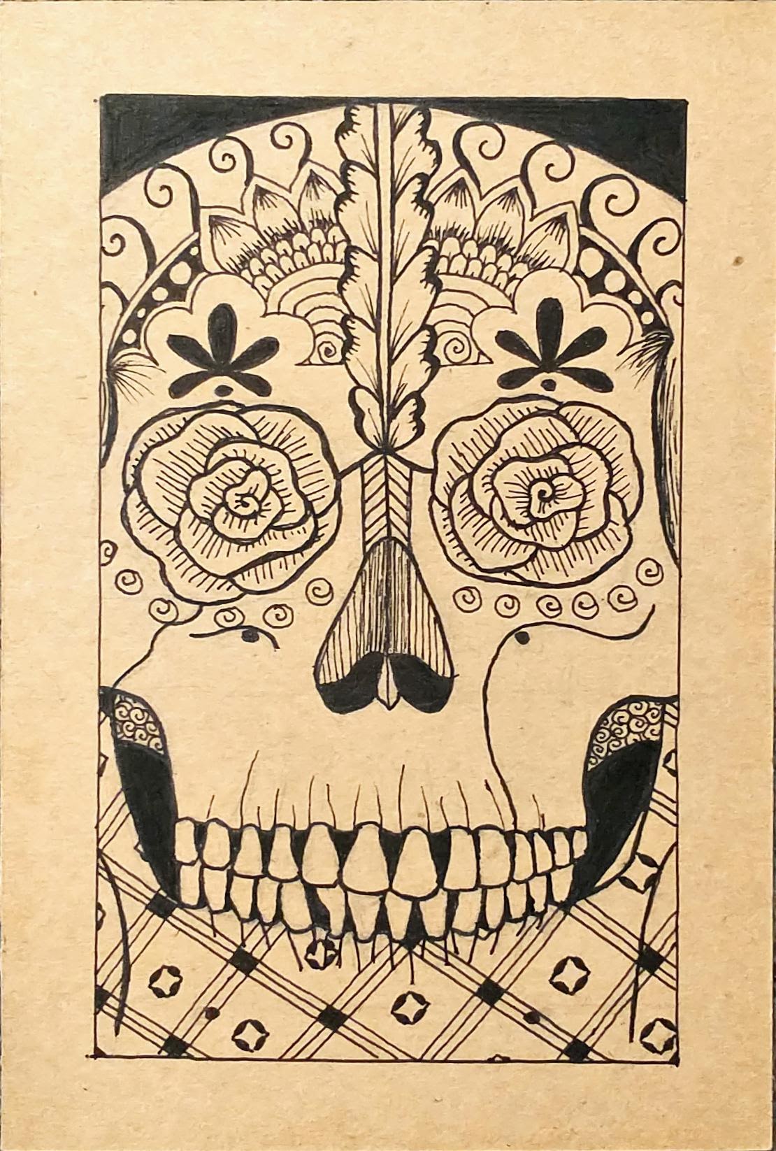 Drawing of a skull decorated with henna patterns.